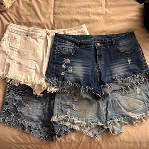 Bundle of 4 pairs mid rise stretch jean shorts